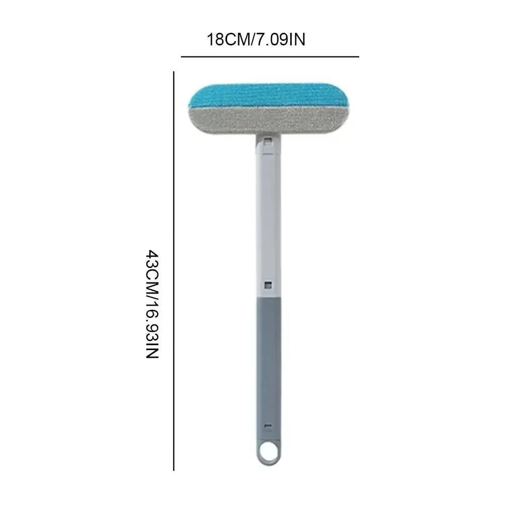 Cepillo multiuso gris y azul para remover pelo de mascotas con cabezal plano.