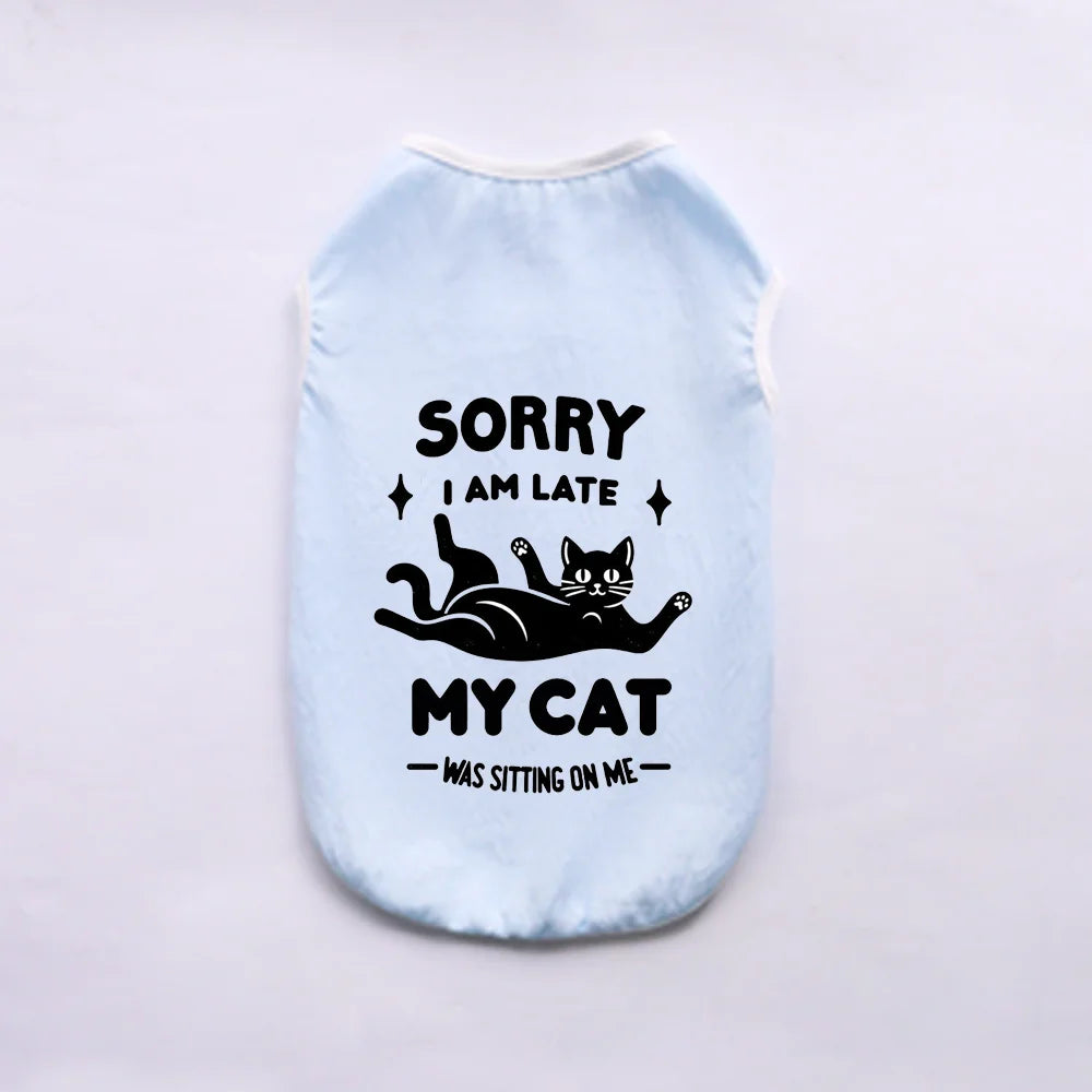 Light blue pet vest with black text that reads Sorry I am late my cat was sitting on me