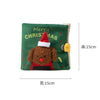 A green fabric book toy featuring a brown bear character wearing a red Santa hat and Christmas text.