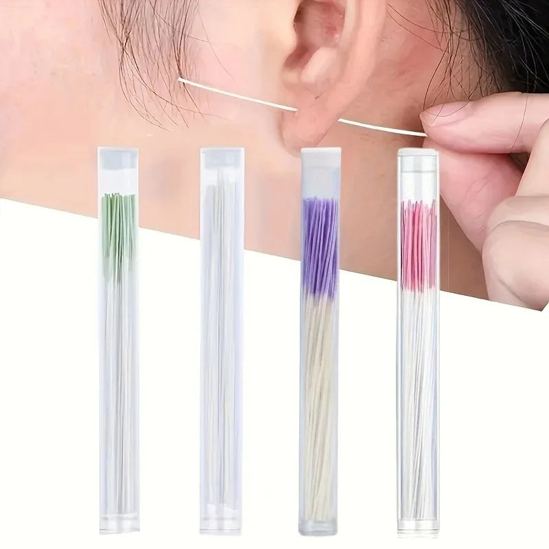 A set of disposable ear cleaning tools featuring various colored thin sticks for cleaning ears.
