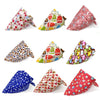 A collection of colorful patterned cotton triangle bandanas for dogs and cats.