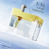 A clear glass water fountain with a yellow top is shown, featuring a 1.5L large capacity.