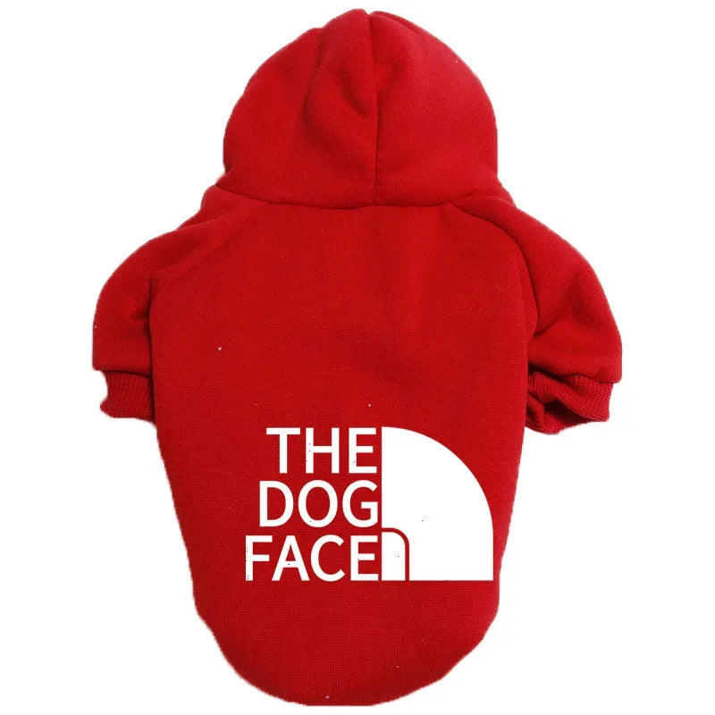 A red fleece hoodie featuring the text THE DOG FACE in white lettering.
