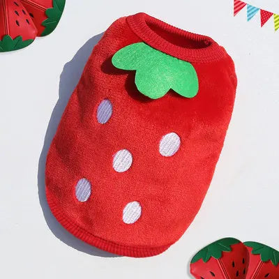 A red fleece vest shaped like a strawberry with green accents and white spots.