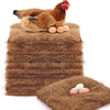 A brown hen is resting on a thick, fibrous coconut coir nest used as a lining for chicken coops.