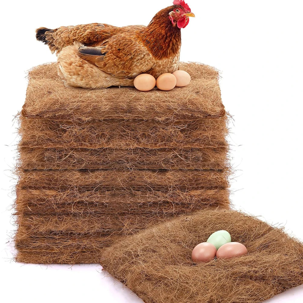 A brown hen is resting on a thick, fibrous coconut coir nest used as a lining for chicken coops.