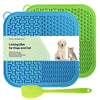 A blue silicone licking mat for dogs and cats with suction cups and a green silicone spoon.