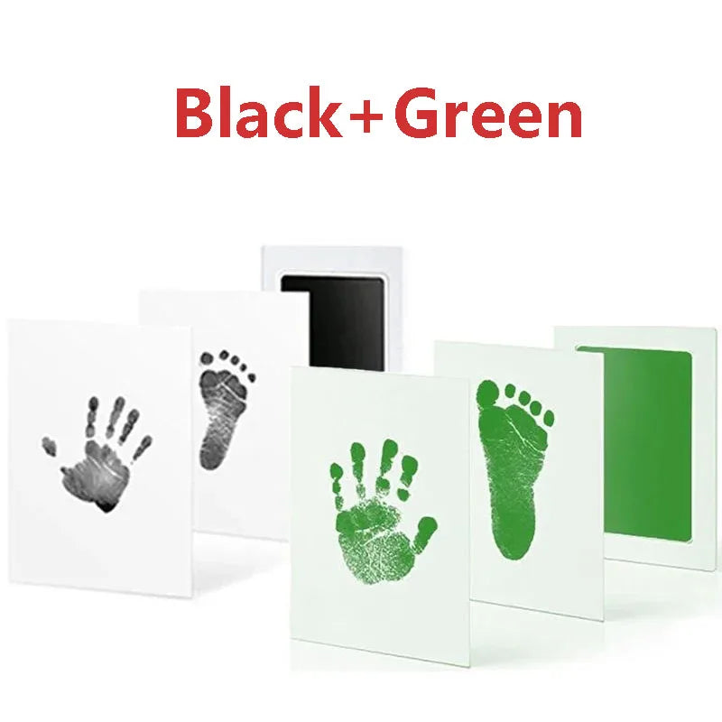 Black and green baby handprint and footprint kits displayed on a white background.