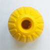 A bright yellow, durable rubber fetch ball with ribbed texture.