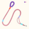 Correa de perro ajustable sin correa rosa con detalles en morado y naranja.