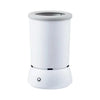 A white automatic pet paw cleaner cup with a cylindrical design and a charging port visible on the base.