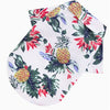 Hawaiian style pet dog summer beach shirt featuring a vibrant tropical floral print on a white fabric.