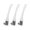 Trois brosses de nettoyage pour cage d'animal en silicone blanc avec poils gris