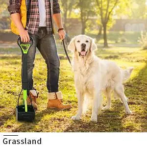 A person is using a portable foldable dog poop scooper to pick up dog waste on the grass.