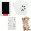 A set of pet paw prints on white cards with an instruction sheet for making inkless pet paw prints