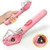 A pink portable handheld insect catcher with a clear plastic collection chamber is shown being held by a hand.