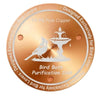 A round, polished copper disc used for bird bath purification.