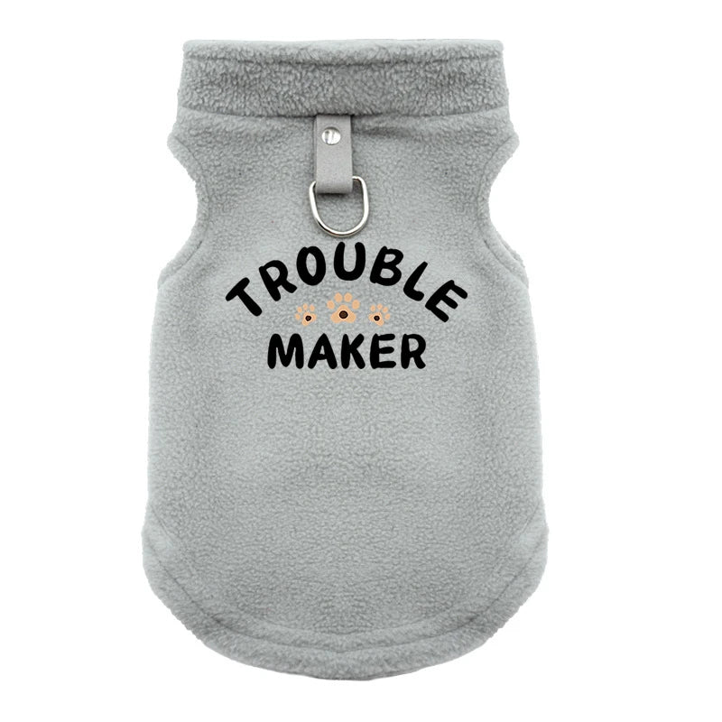 A gray cozy winter pet jacket for dogs with a metal clasp.
