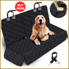 A black quilted waterproof car dog seat cover mat with a golden retriever dog lying on it.