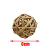 A spherical chew toy made of woven natural wood for small rodents.