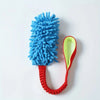 A bright blue plush toy with a red rope attached, designed as a pull toy for pets.