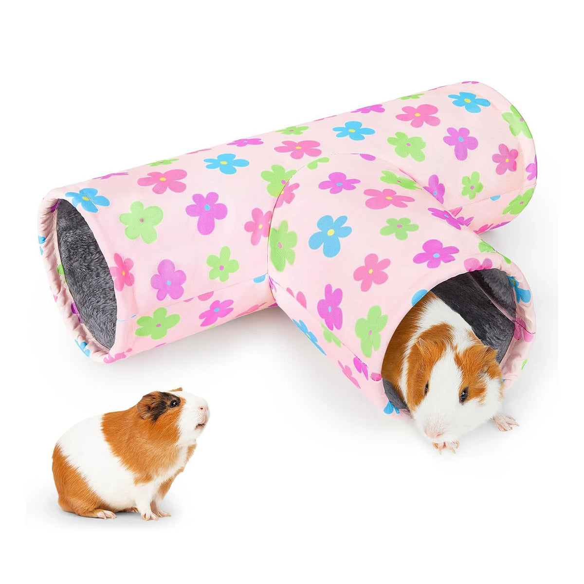 A pink floral fabric pet tunnel with a gray lining and a small guinea pig is visible.