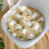 A beige macrame cat hammock bed for pet decor with a repeating pattern of white cats.