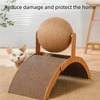A wooden cat scratcher featuring a sisal ball for cats, placed on a rug.