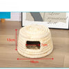 A natural straw woven mat with a dark entrance for small rodents, measuring 13cm high and 18cm wide.