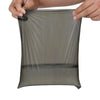 A hand is holding a clear, flexible biodegradable dog poop bag with an easy-tear design.