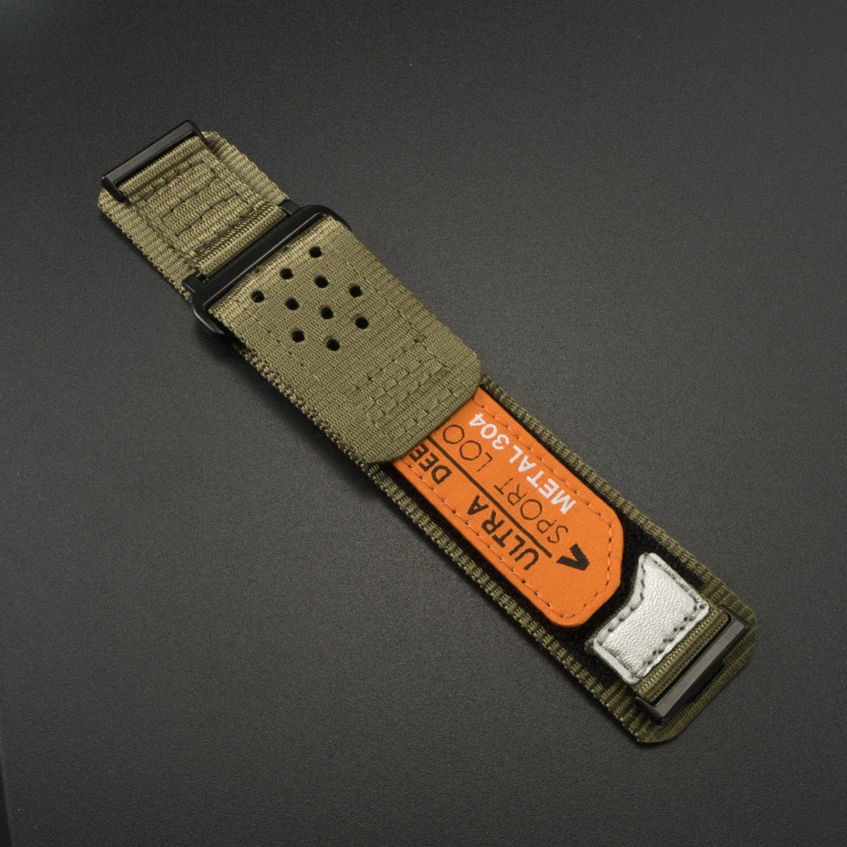 A close-up of a dark olive green breathable nylon sport band for a Huawei watch, featuring a metal loop and a white accent.