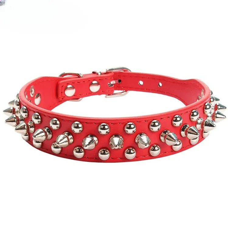 Red leather dog collar with silver spikes and a buckle closure