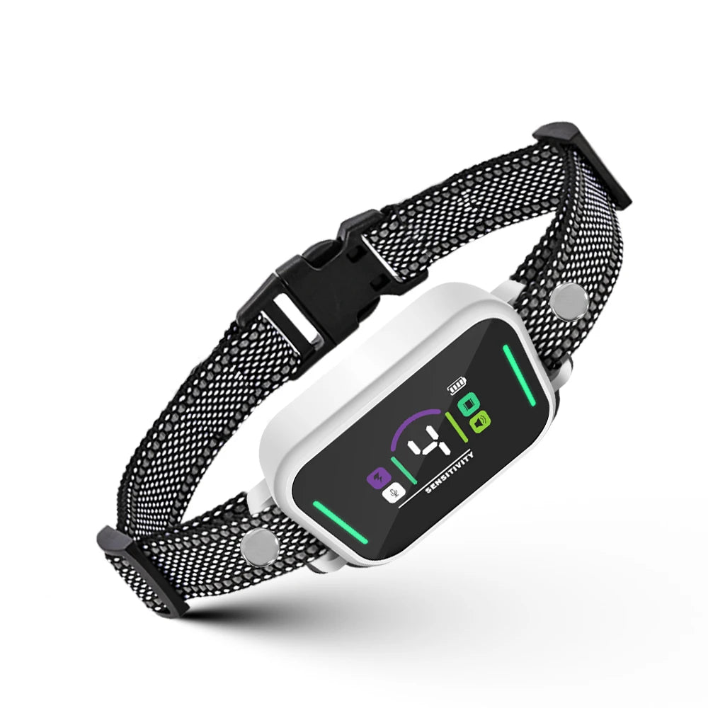 A white adjustable dog bark collar with a black strap and a digital display showing sensitivity settings.