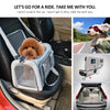 A fluffy dog is sitting inside a gray travel pet carrier bag in the back seat of a car.