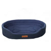 A dark blue washable waterproof dog bed mat with a padded, dog-shaped insert.