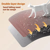 A white cat is standing on a double-layer cat litter mat, demonstrating its ability to prevent sand from being swept.