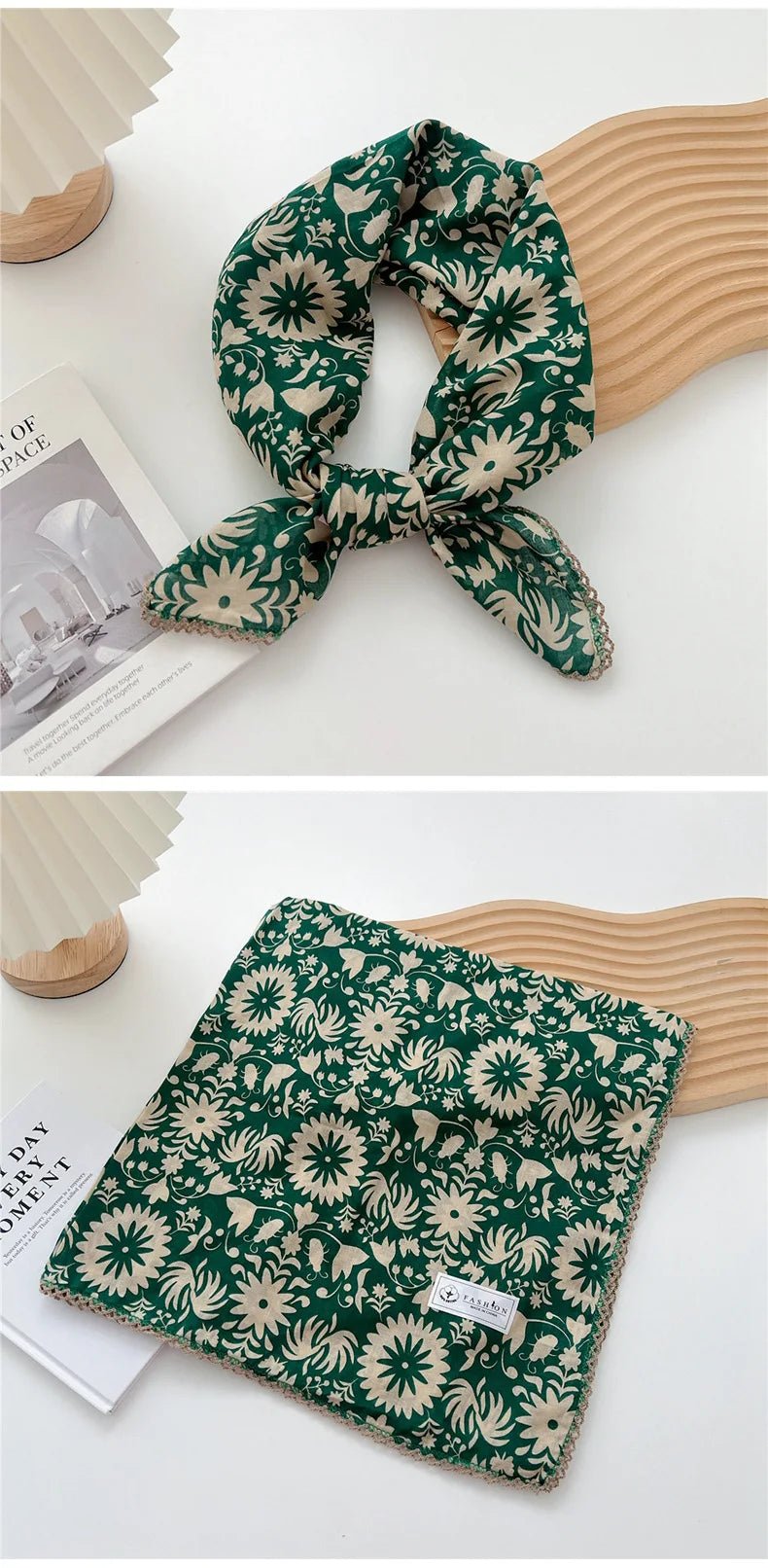 Écharpe en coton à motif floral vert foncé nouée en nœud, présentée à côté d'un objet en bois clair.