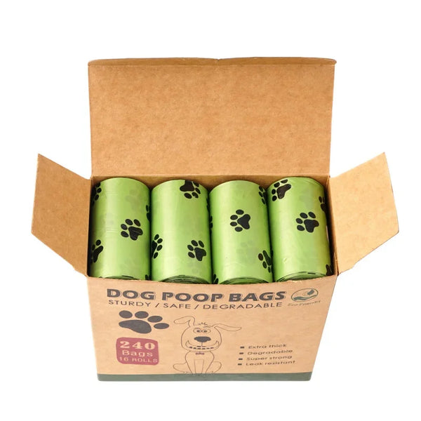 A box containing 10 rolls of green biodegradable dog poop bags.