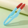 A pair of light blue and red pet tear stain remover combs are shown against a light green background.