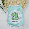 A light mint green dog vest shirt featuring a cute green dinosaur design and the text Love Me