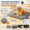 A golden retriever lies on a gray waterproof Oxford dog mat with cushioned support, demonstrating durability and comfort.