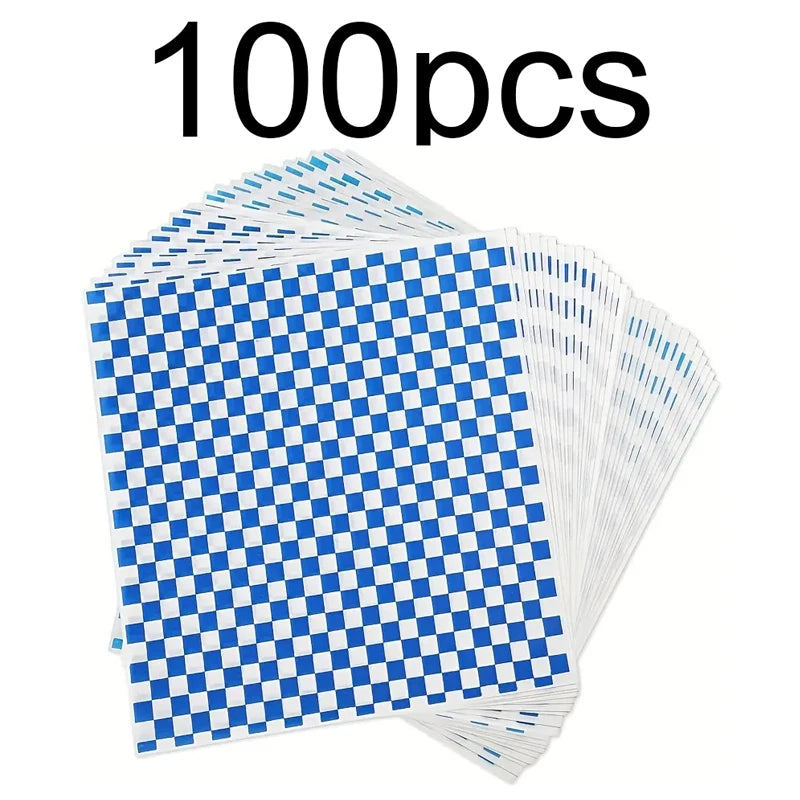 A stack of 100 sheets of blue and white checkerboard oil-proof sandwich wrapping paper.