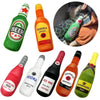 A collection of various bottle-shaped squeaky plush dog toys including beer tequila vodka red wine bourbon whiskey and champa