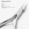 A close-up view of a silver precision stainless steel cuticle nipper tool.