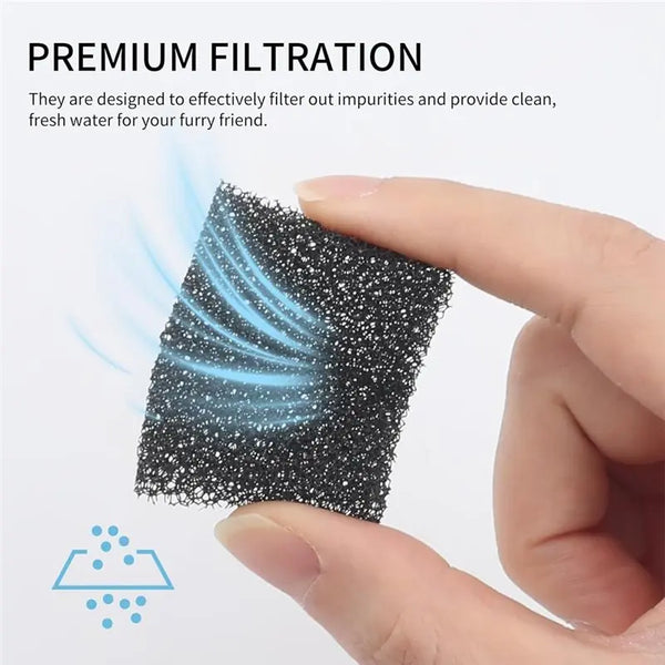 A hand holds a black foam filter for pet water fountains, demonstrating premium filtration.