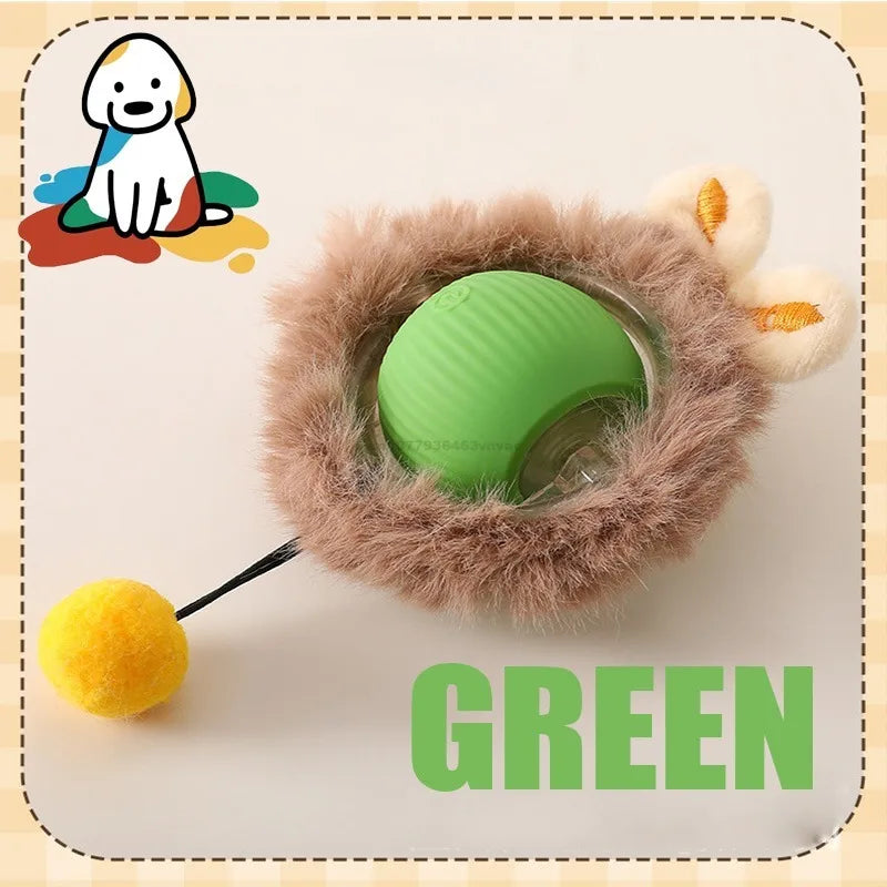 A green automatic rolling interactive ball for cats surrounded by fluffy fur and a small yellow ball.