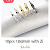 A set of 10 antique silver wing charms with zip attachments displayed on a white surface.