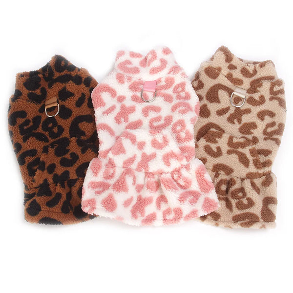 Three leopard print dog princess dresses in brown, pink, and tan colors