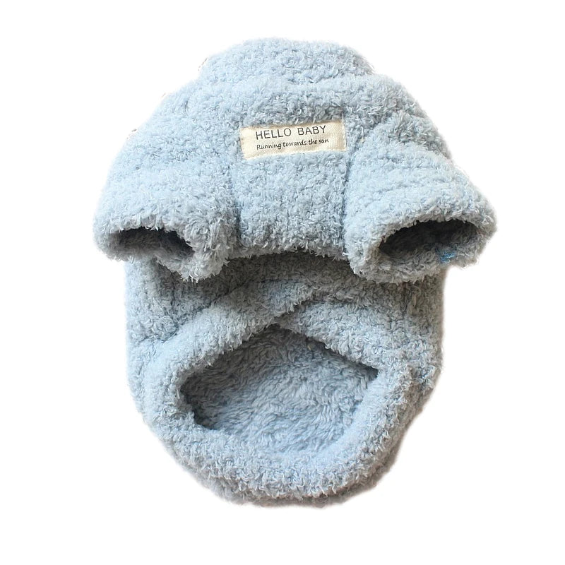 Suéter de perro de invierno de peluche azul claro con una etiqueta que dice Hola Bebé Corriendo hacia el sol
