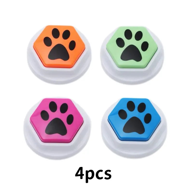 Four colorful recordable talking buttons for dog training featuring paw print designs.